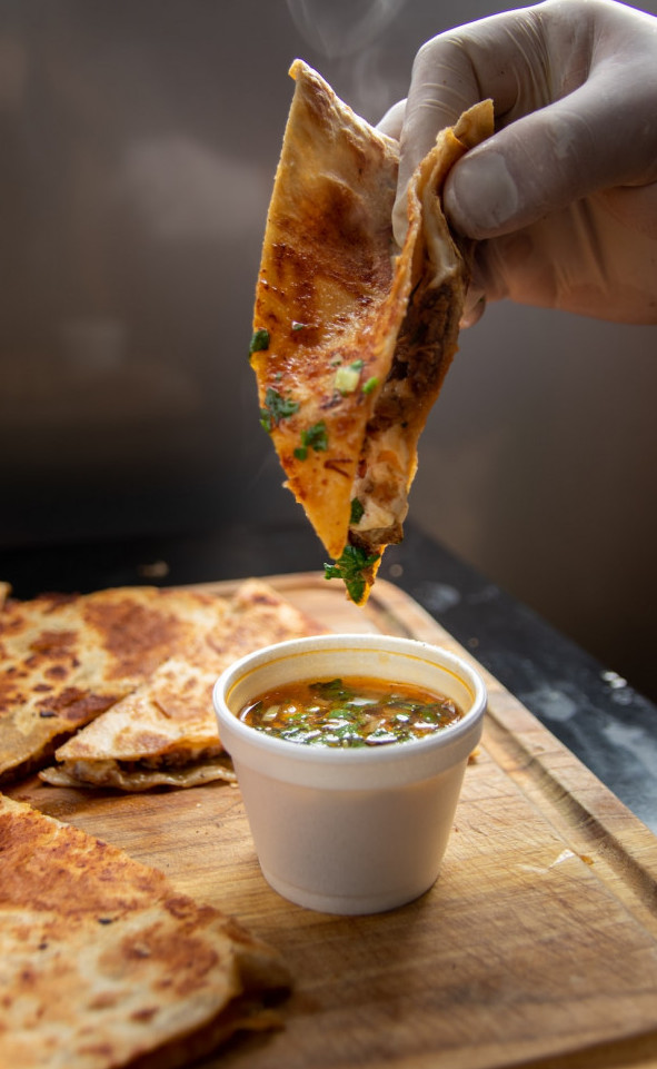 This image has an empty alt attribute; its file name is quesadilla-w-vegetable-dip.jpg